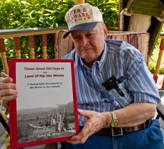 Local historian and author John M. Ham poses with his latest book. The quality of the B&W photos in this one is amazing.