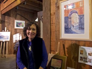 Sheila Trautman poses near her work.