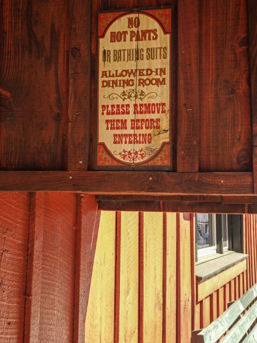 ...and a cautionary sign at  Clayton Delaney's Dining Saloon