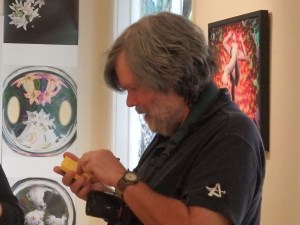 Vincent Bilotta with more of his images in the background